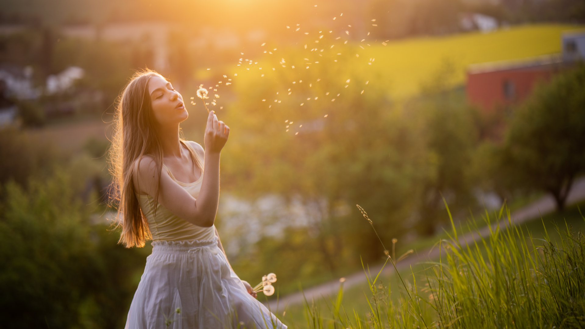 girl-blowing-flower-5k-ot-1920x1080.jpg