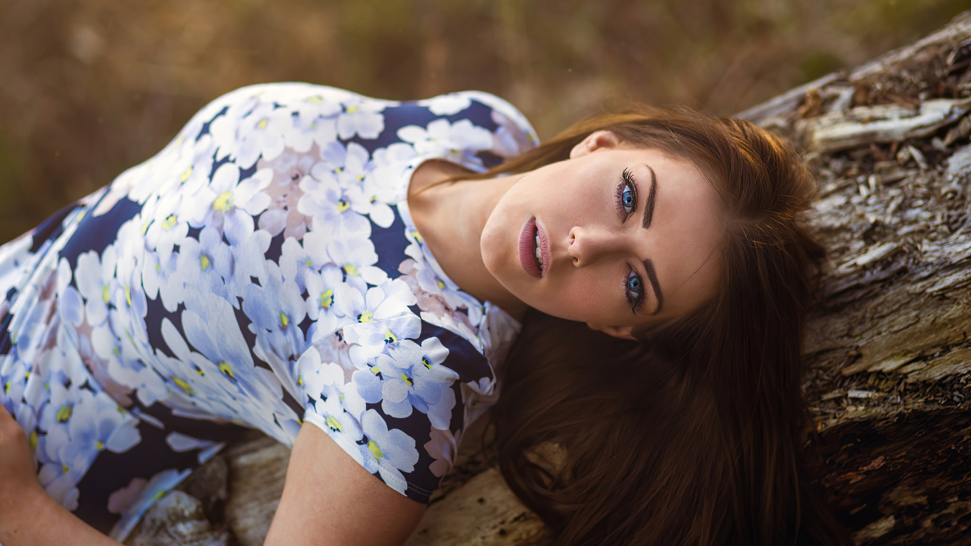 girl-lying-hair-hanging-down-4k-lv-1920x1080.jpg