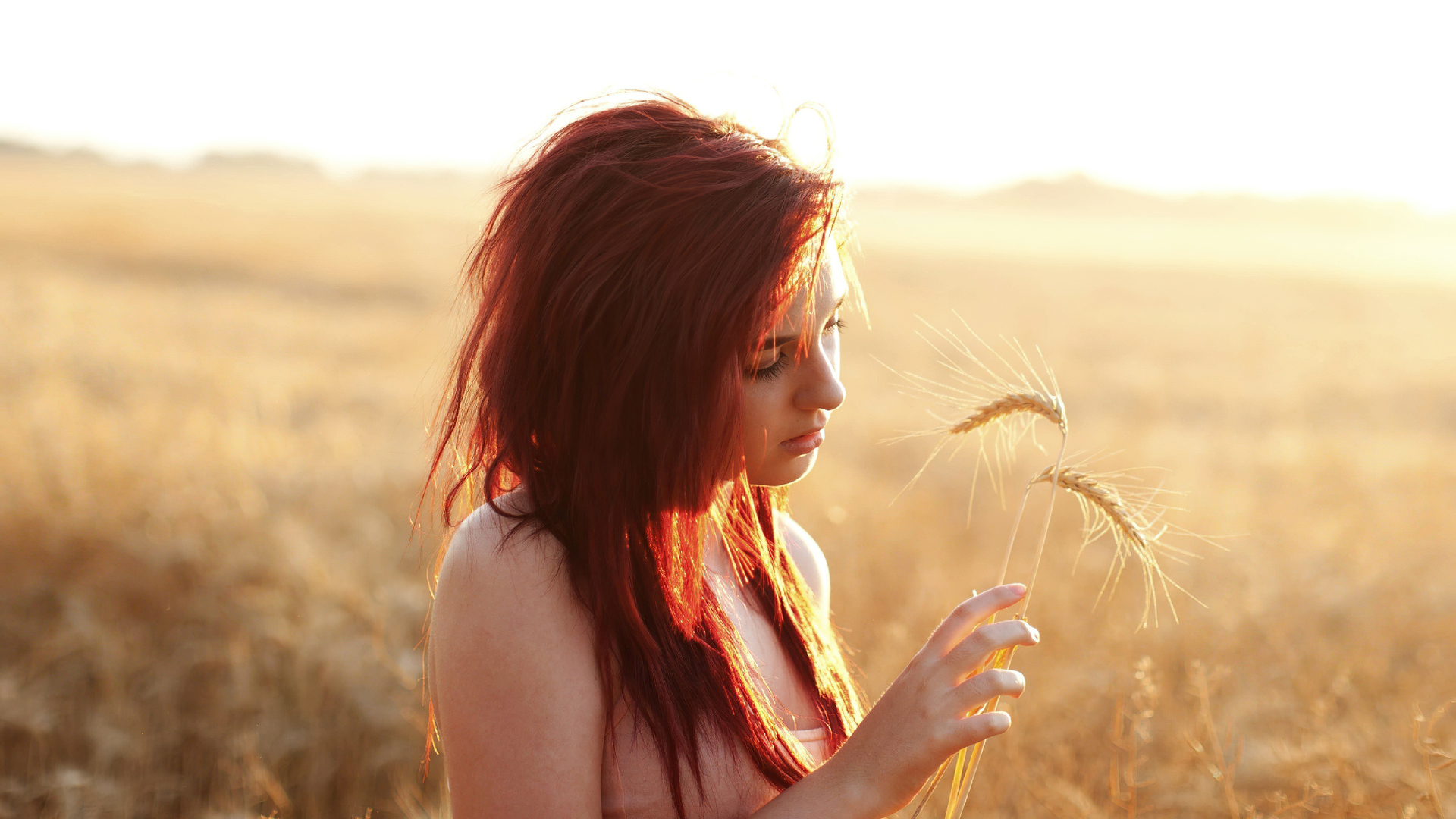 redhead-girl-field-plants-4k-bc-1920x1080.jpg